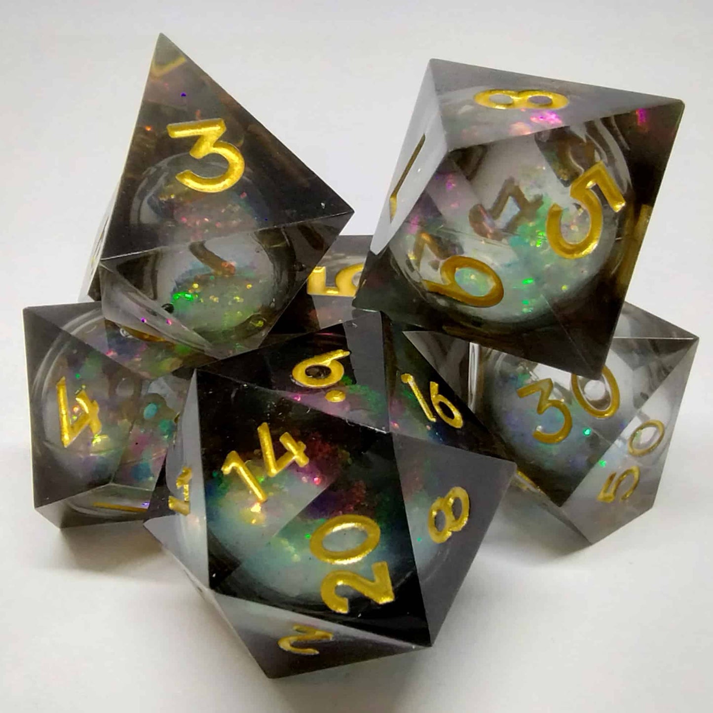 Liquid Core Black and Gold Sharp Edge Resin 7 Piece Dice Set image 0