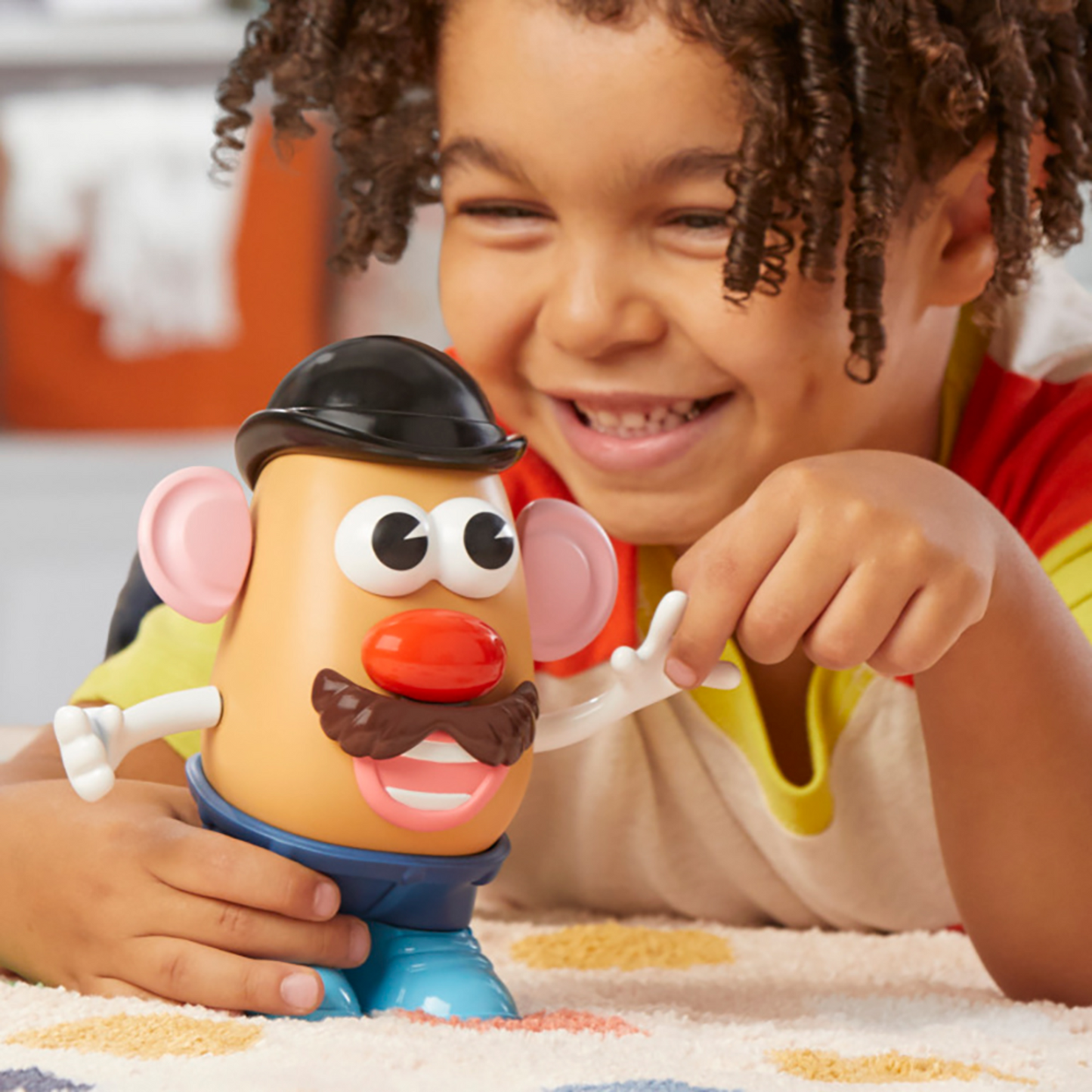 Child Playing with Mr Potato Head