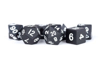 MDG Black w/ White Metal Dice 7pc Set image 0